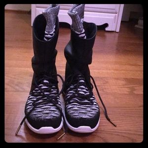 Nike Boots with socks attached.